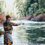 Photo by Greysen Johnson man fishing during daytime